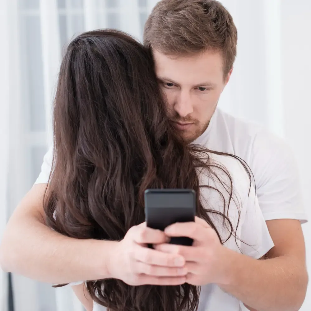 Woman feeling ignored by phone-obsessed partner